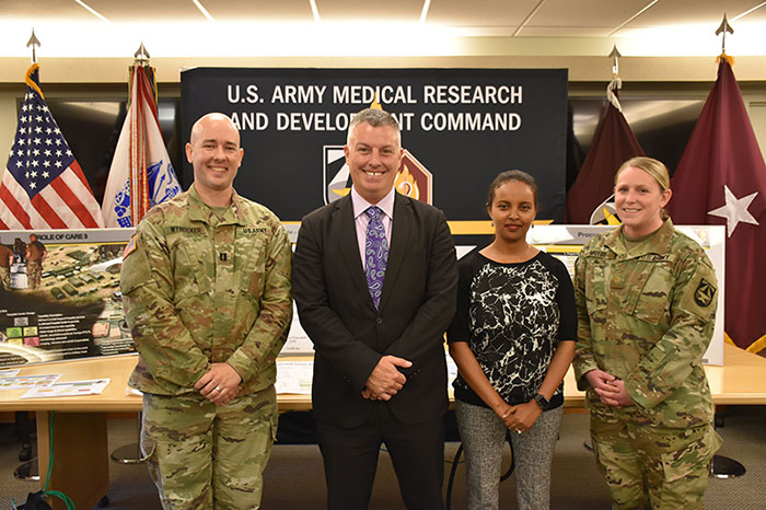 Dr. Tyler Bennett, Capt. Scott Wynocker, Bennett, Saba Getachew and Army Maj. Janessa Moyer