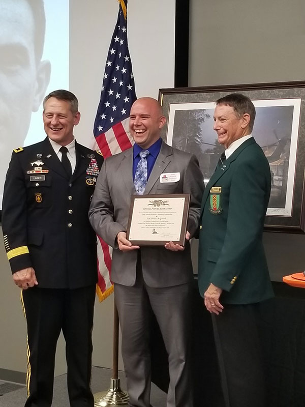 Sgt. 1st Class Daniel McGarrah receives an academic scholarship